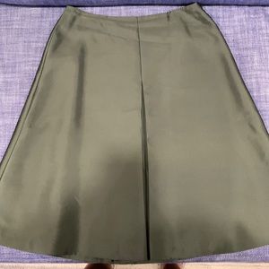 Yansi Fugel silk knee high skirt in olive green.